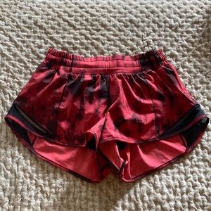 Red and black Lululemon Hotty hot shorts